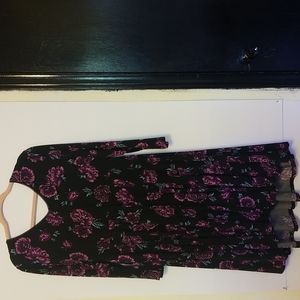 Purple floral midlength dress.